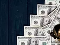 Stack%20of%20money%20dollars%20laid%20out%20like%20a%20ladder%20